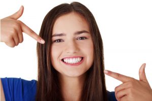 a girl with a healthy teeth | Healthy teeth Habits